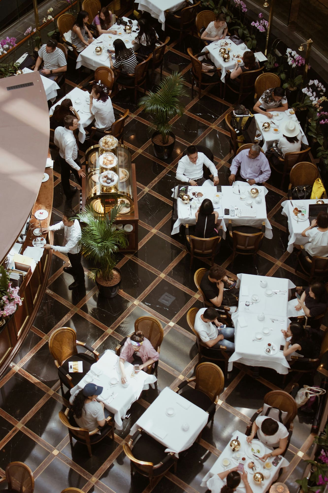 A busy restaurant seen from above, the kind of local business Bonice runs in